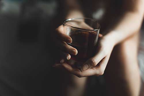woman considers alcohol detox